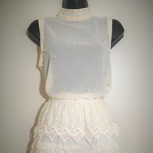 Lace skirt and pearl-top set